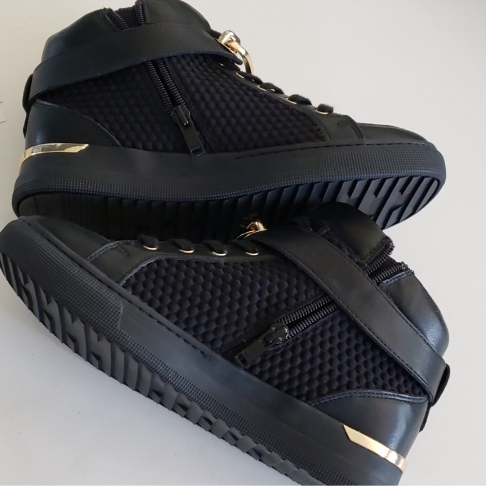 Aldo black and gold high tops like new in excellent condition worn once